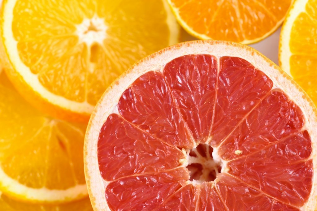 a close up of a grapefruit cut in half, Benefits of Grapefruit