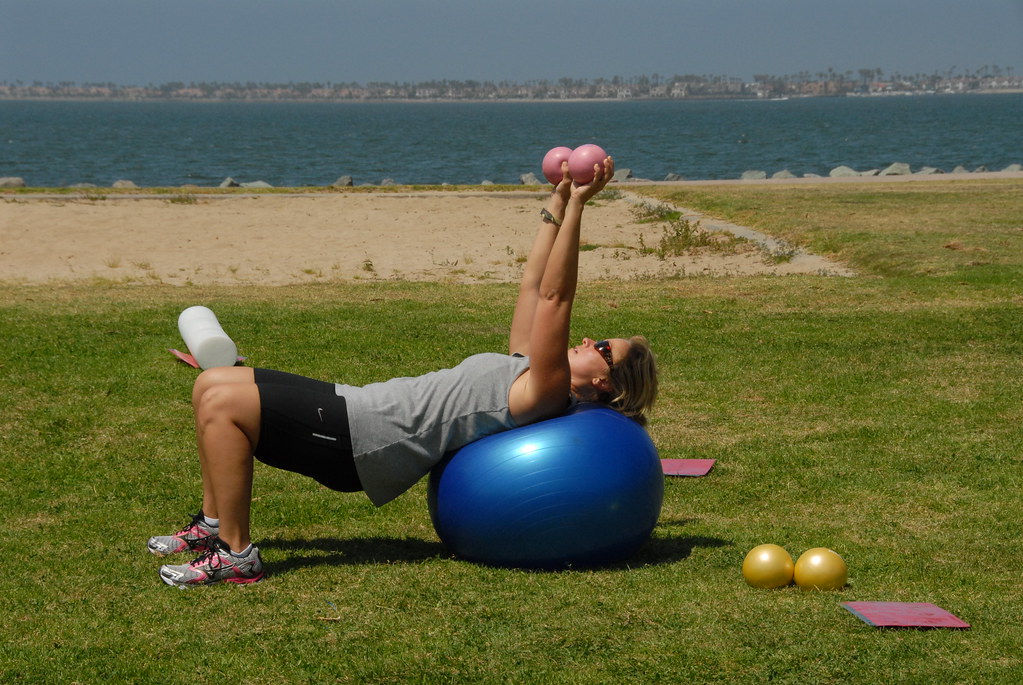 11 Pilates Ball Exercises for Core Strength, Balance, & Flexibility