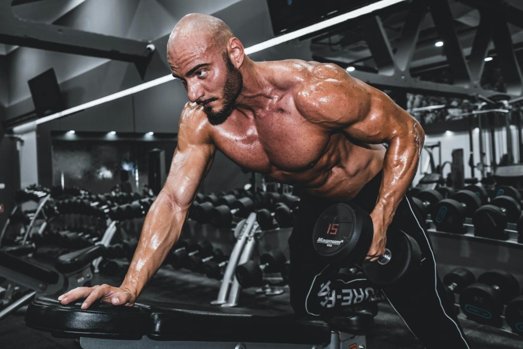 13 Best Dumbbell Trap Exercises for Stronger, Bigger Traps