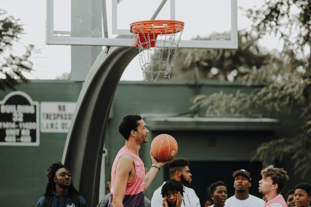 man holding basketball