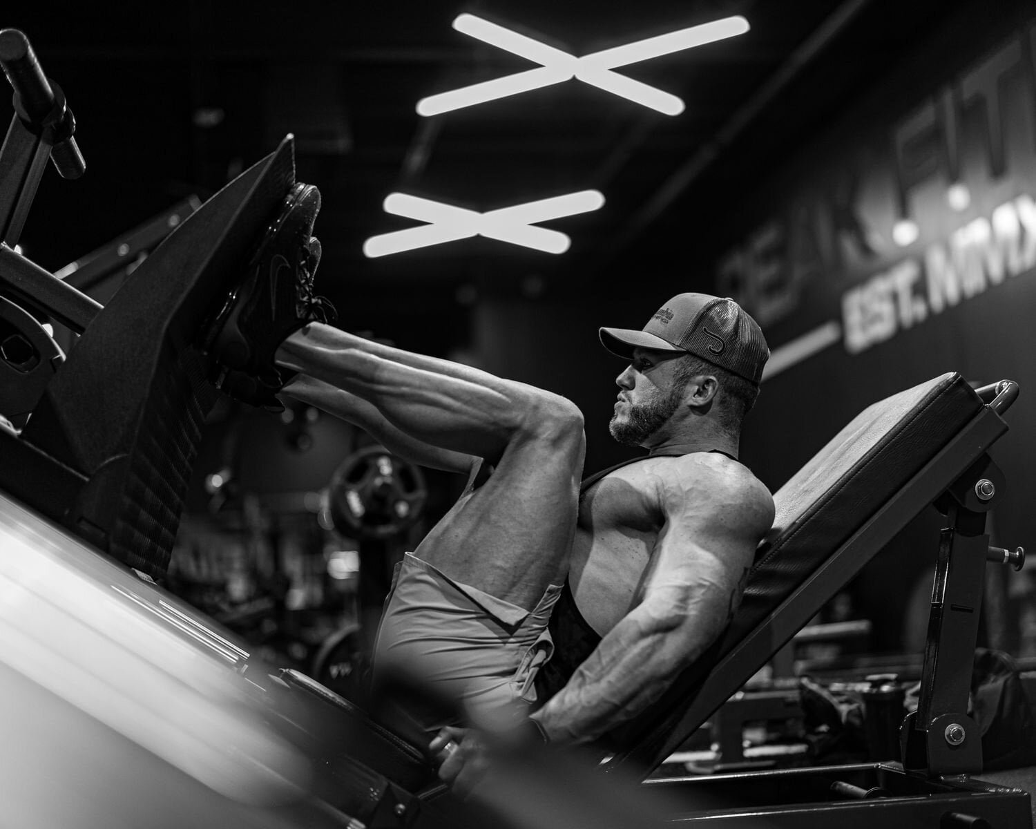 Leg Press: Proper Form, Muscles Worked, Benefits & Tips